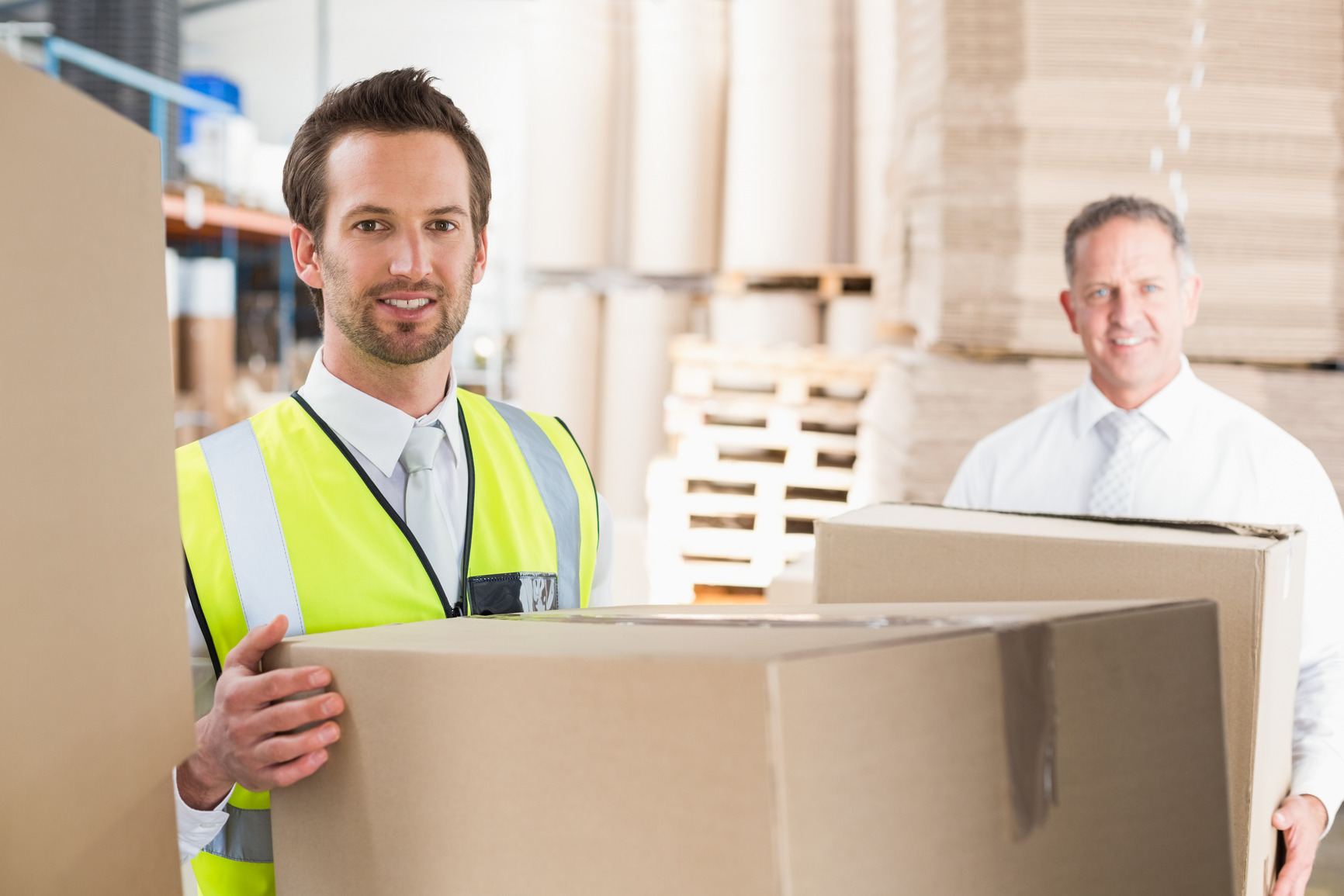 delivery-driver-loading-his-van-with-boxes-outside-the-warehouse